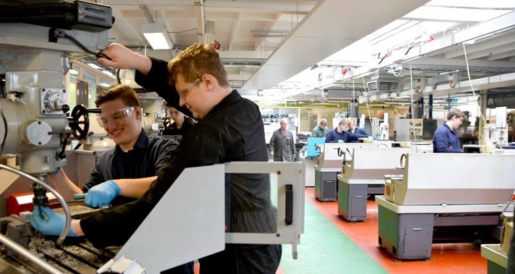 Two students in a workshop